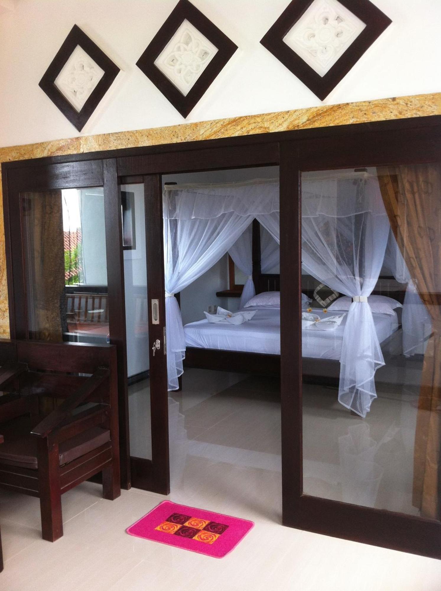 Bubu Racok Homestay アメッド 部屋 写真